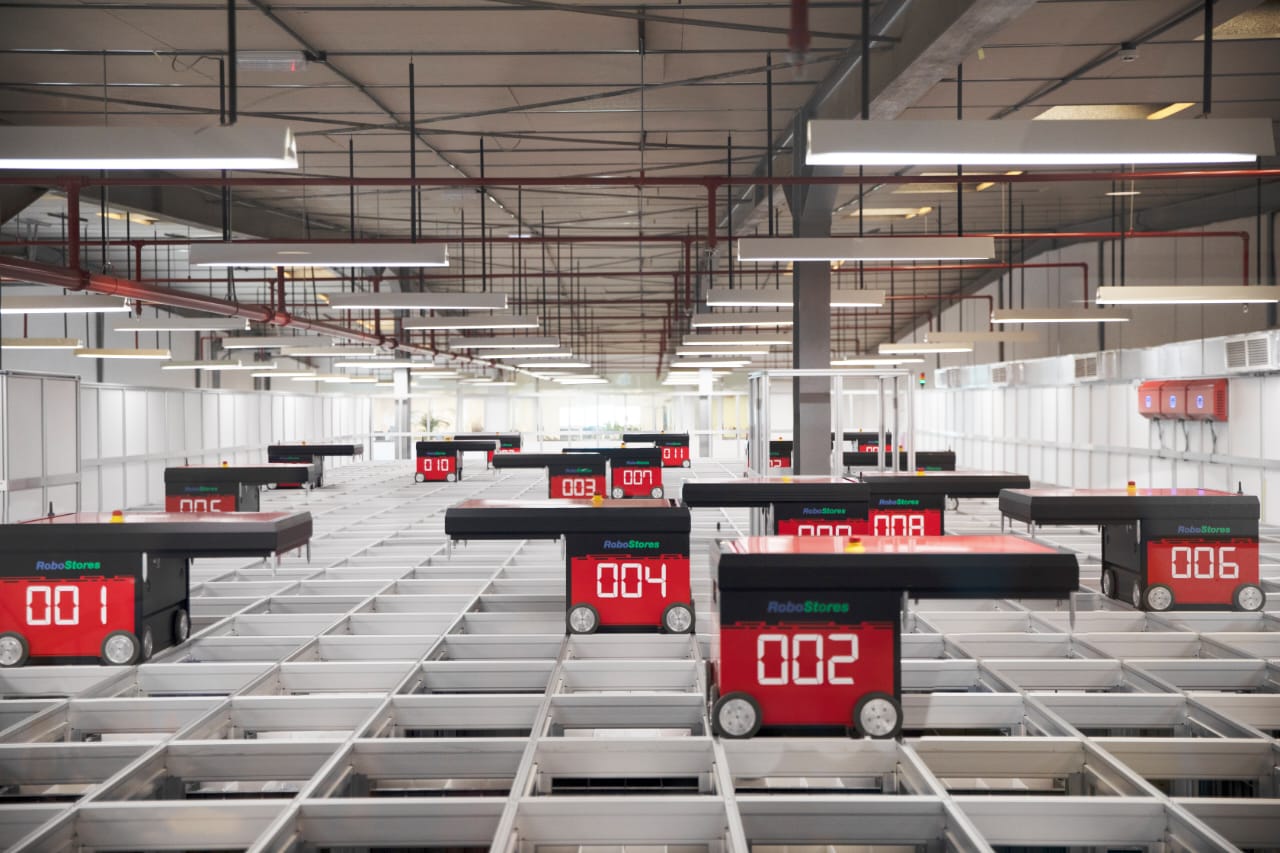 RoboStores robotic picking system inside automated warehouse